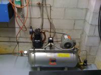 Air compression for building HVAC system